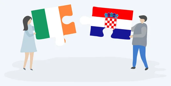 Пара Держащая Две Головоломки Ирландскими Хорватскими Флагами Ирландия Хорватия Вместе — стоковый вектор