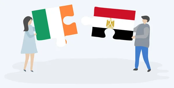 Casal Segurando Duas Peças Quebra Cabeças Com Bandeiras Irlandesas Egípcias —  Vetores de Stock