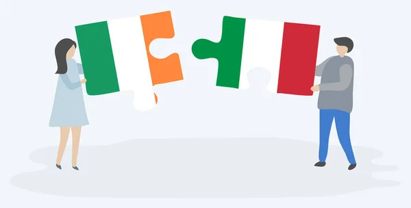 Pareja Sosteniendo Dos Piezas Rompecabezas Con Banderas Irlanda Italia Irlanda — Vector de stock