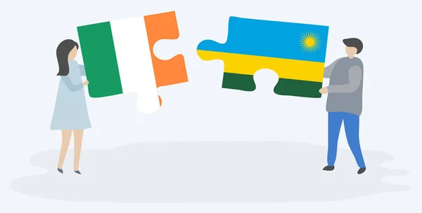 Paar Mit Zwei Puzzleteilen Mit Irischen Und Ruandischen Flaggen Nationale — Stockvektor