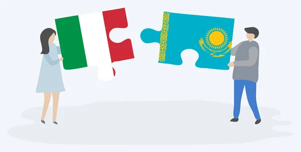 Para Trzymania Dwóch Puzzli Włoskich Kazachskich Flag Symbole Narodowe Włoch — Wektor stockowy