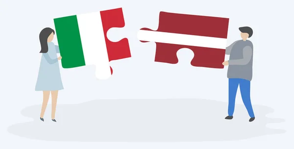 Para Trzyma Dwa Kawałki Puzzli Flag Włoskich Łotewskich Włochy Łotwa — Wektor stockowy