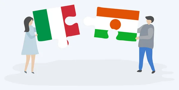 Paar Houden Twee Puzzels Stukken Met Italiaanse Nigerien Vlaggen Italië — Stockvector