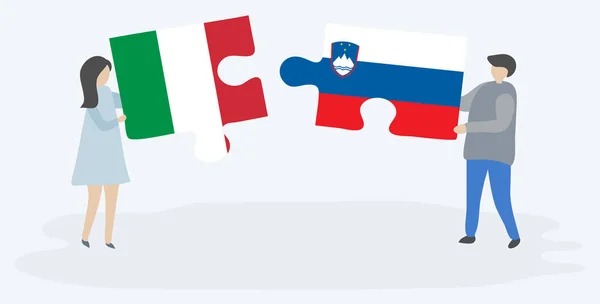 Ζευγάρι Που Κρατά Δύο Κομμάτια Παζλ Ιταλικές Και Σλοβενικές Σημαίες — Διανυσματικό Αρχείο