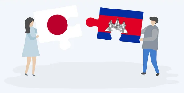 Paar Houden Twee Puzzels Stukken Met Japanse Cambodjaanse Vlaggen Japan — Stockvector