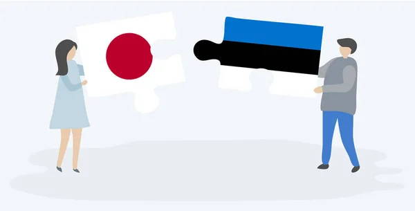 Ζευγάρι Που Κρατά Δύο Κομμάτια Παζλ Ιαπωνικές Και Εσθονικές Σημαίες — Διανυσματικό Αρχείο