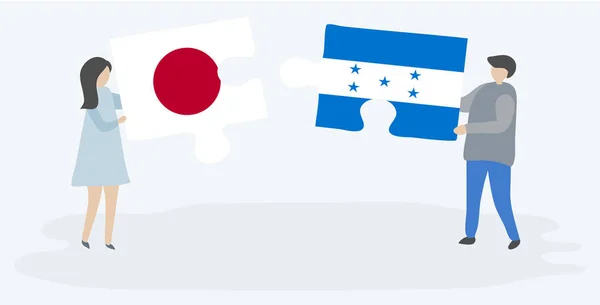 Japon Honduras Bayrakları Ile Iki Bulmaca Parçaları Tutan Çift Japonya — Stok Vektör