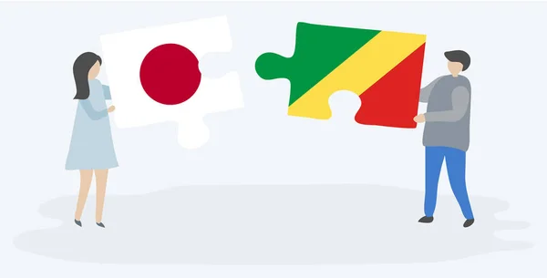 Couple Tenant Deux Pièces Puzzles Avec Des Drapeaux Japonais Congolais — Image vectorielle