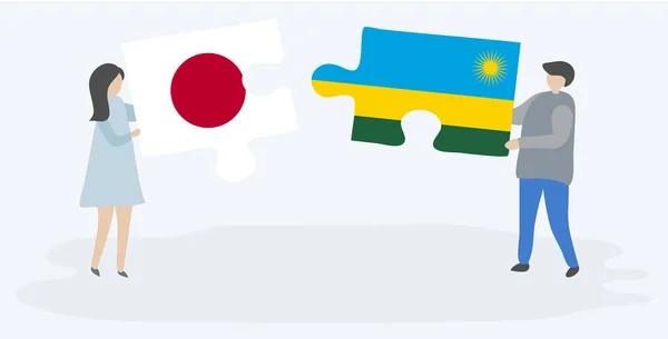 Pareja Sosteniendo Dos Piezas Rompecabezas Con Banderas Japonesas Ruandesas Japón — Vector de stock
