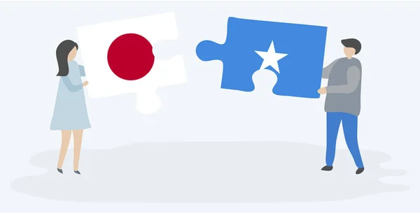 Paar Mit Zwei Puzzleteilen Mit Japanischen Und Somalischen Flaggen Japanische — Stockvektor