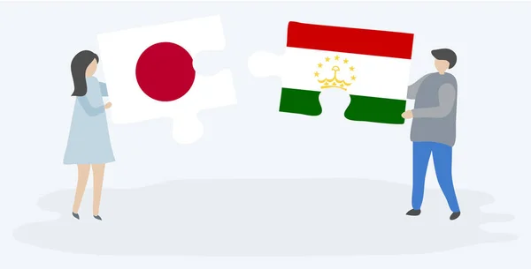 Casal Segurando Duas Peças Quebra Cabeças Com Bandeiras Japonesas Tajiquistanesas —  Vetores de Stock