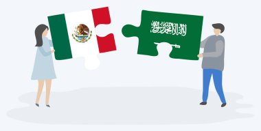 Meksika ve Suudi Arabistan bayrakları ile iki bulmaca parçaları tutan çift. Meksika ve Suudi Arabistan ulusal sembolleri birlikte.
