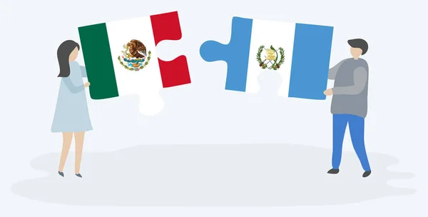 Para Trzyma Dwa Puzzle Kawałki Meksykańskimi Gwatemali Flagi Symbole Narodowe — Wektor stockowy