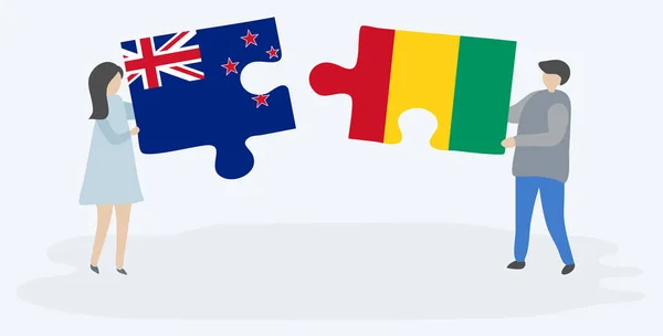 Paar Houden Twee Puzzels Stukken Met Guinean Vlaggen Nieuw Zeeland — Stockvector
