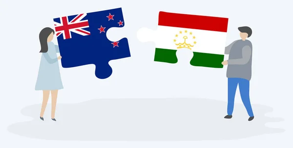 Paar Houden Twee Puzzels Stukken Met Tajikistani Vlaggen Nieuw Zeeland — Stockvector