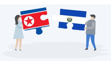 Kuzey Kore ve Salvador bayrakları ile iki bulmaca parçaları tutan çift. Kuzey Kore ve El Salvador ulusal sembolleri birlikte.