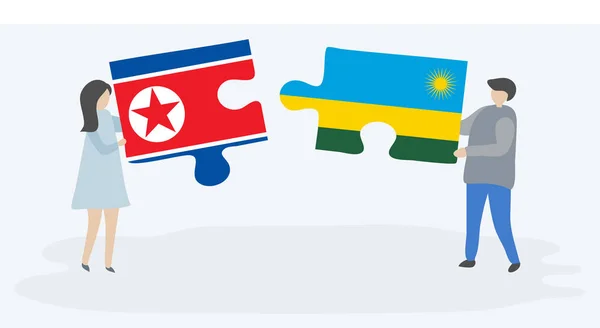Pareja Sosteniendo Dos Piezas Rompecabezas Con Banderas Corea Del Norte — Vector de stock