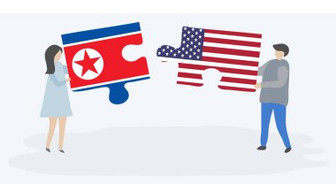 Çift Kuzey Kore ve Amerikan bayrakları ile iki bulmaca parçaları tutan. Kuzey Kore ve Amerika Birleşik Devletleri ulusal sembolleri birlikte.