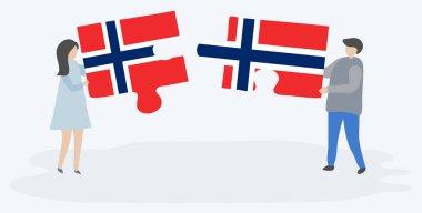 Çift Norveç ve Norveç bayrakları ile iki bulmaca parçaları tutan. Norveç ve Norveç ulusal sembolleri birlikte.
