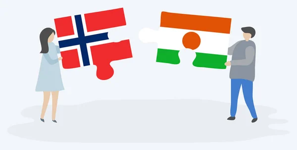 Para Trzyma Dwa Kawałki Puzzli Norweskimi Nigerienskimi Flagami Symbole Narodowe — Wektor stockowy