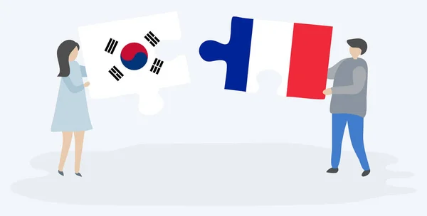 Para Trzyma Dwa Kawałki Puzzli Południowokoreańskich Francuskich Flag Korea Południowa — Wektor stockowy