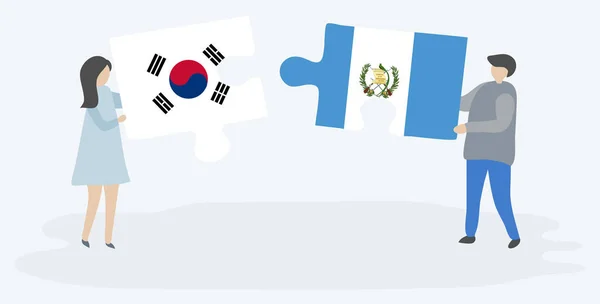 Para Trzyma Dwa Puzzle Kawałki Korei Południowej Gwatemali Flagi Korea — Wektor stockowy