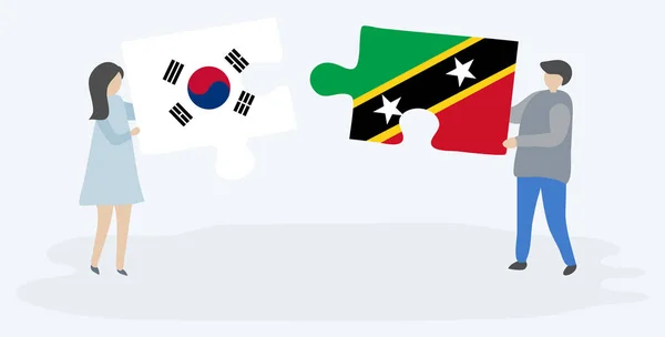 Paar Houden Twee Puzzels Stukken Met Zuid Koreaanse Kittitian Vlaggen — Stockvector