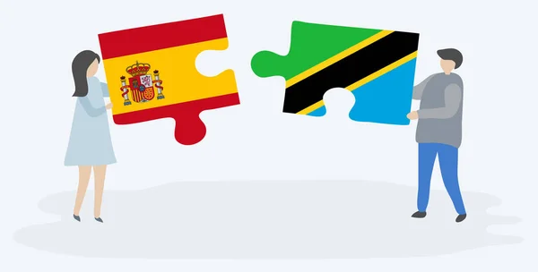 Spanyol Tanzanya Bayrakları Ile Iki Bulmaca Parçaları Tutan Çift Spanya — Stok Vektör