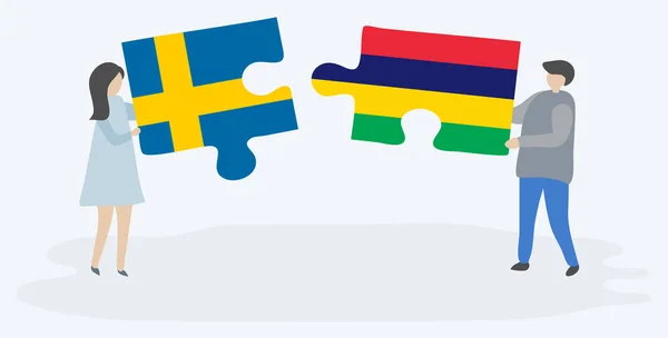 Ζευγάρι Που Κρατά Δύο Κομμάτια Παζλ Σουηδικά Και Μαυρικίου Σημαίες — Διανυσματικό Αρχείο