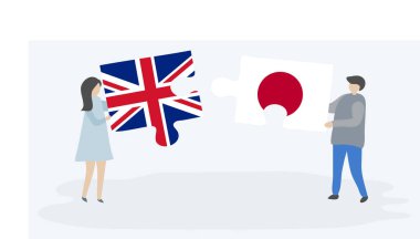 İngiliz ve Japon bayrakları ile iki bulmaca parçaları tutan çift. Birleşik Krallık ve Japonya ulusal sembolleri birlikte.