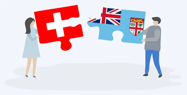 Pareja Sosteniendo Dos Piezas Rompecabezas Con Banderas Suizas Fiyianas Suiza — Vector de stock