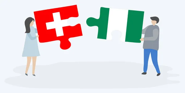 Pareja Sosteniendo Dos Piezas Rompecabezas Con Banderas Suizas Nigerianas Suiza — Archivo Imágenes Vectoriales