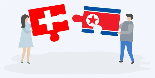 Couple Holding Two Puzzles Pieces Swiss North Korean Flags Switzerland — Stock Vector