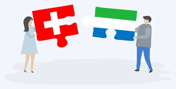 Pareja Sosteniendo Dos Piezas Rompecabezas Con Banderas Suizas Sierra Leona — Archivo Imágenes Vectoriales