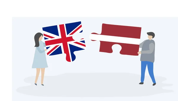Pareja Sosteniendo Dos Piezas Rompecabezas Con Banderas Británicas Letonas Reino — Vector de stock