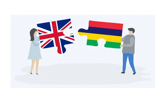 Пара Держащая Две Головоломки Британскими Маврикийскими Флагами Великобритания Маврикий Вместе — стоковый вектор