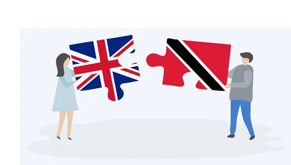 Paar Houden Twee Puzzels Stukken Met Britse Trinidadian Vlaggen Verenigd — Stockvector