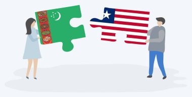 Türkmen ve Liberya bayrakları ile iki bulmaca parçaları tutan çift. Türkmenistan ve Liberya ulusal sembolleri birlikte.