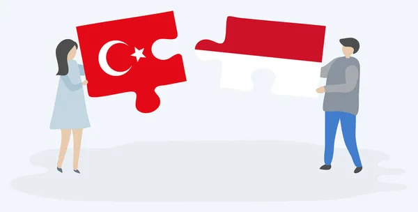 Türk Endonezya Bayrakları Ile Iki Bulmaca Parçaları Tutan Çift Türkiye — Stok Vektör