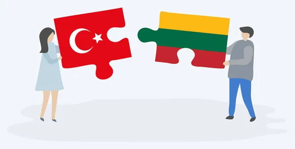 Türk Litvanya Bayrakları Ile Iki Bulmaca Parçaları Tutan Çift Türkiye — Stok Vektör