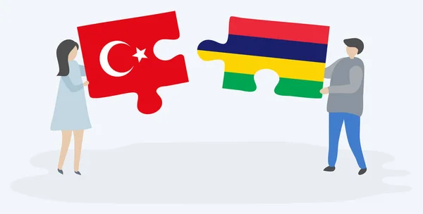 Türk Moritanya Bayrakları Ile Iki Bulmaca Parçaları Tutan Çift Türkiye — Stok Vektör