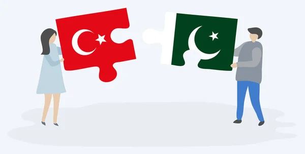 Couple Holding Two Puzzles Pieces Turkish Pakistani Flags Turkey Pakistan — Stock Vector