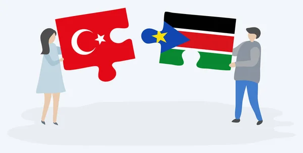 Dvojice Drží Dvě Skládanky Tureckými Jihosúdánskými Vlajkami Národní Symboly Turecka — Stockový vektor