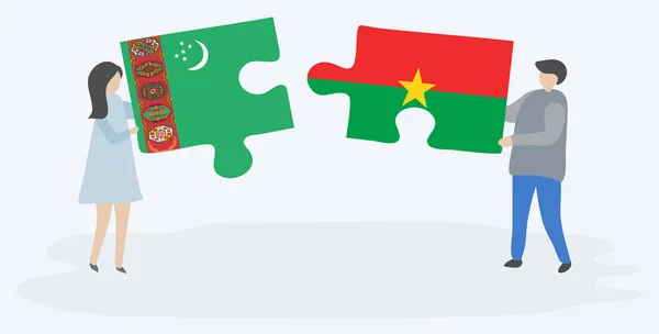Pareja Sosteniendo Dos Piezas Rompecabezas Con Banderas Turcomanas Burkinesas Turkmenistán — Vector de stock