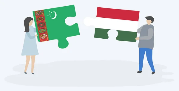 Pareja Sosteniendo Dos Piezas Rompecabezas Con Banderas Turcomanas Húngaras Turkmenistán — Vector de stock