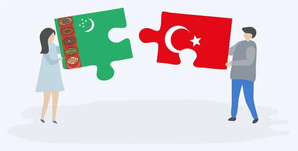 一对夫妇拿着两块拼图 上面挂着土库曼和土耳其国旗 土库曼斯坦和土耳其国家符号在一起 — 图库矢量图片