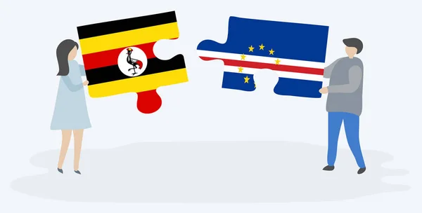 Para Trzymania Dwóch Puzzli Ugandy Cabo Verdean Flagi Symbole Narodowe — Wektor stockowy