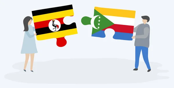 Pareja Sosteniendo Dos Piezas Rompecabezas Con Banderas Ugandesas Comoranas Uganda — Vector de stock