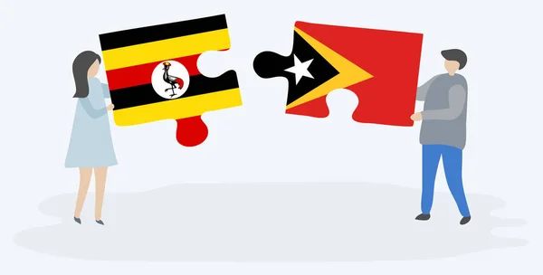 Para Trzyma Dwa Kawałki Puzzli Ugandy Timorese Flagi Uganda Timor — Wektor stockowy