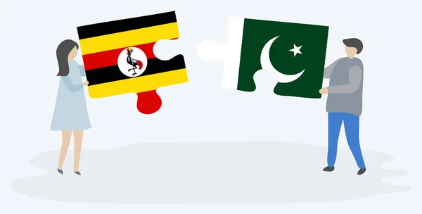 Casal Segurando Duas Peças Quebra Cabeças Com Bandeiras Ugandenses Paquistanesas —  Vetores de Stock